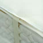 natural organic Wool mattress pad has a snug fit on mattress